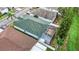 Aerial view of house with a screened patio at 7823 Floradora, New Port Richey, FL 34654