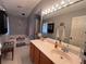 Main bathroom with double vanity and garden tub at 8388 Begonia St, Spring Hill, FL 34608