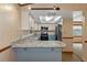 Modern kitchen with stainless steel appliances and breakfast bar at 7208 Clouchester Ct, Hudson, FL 34667