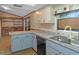 Kitchen features stainless steel appliances and ample counter space at 7208 Clouchester Ct, Hudson, FL 34667