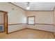Spacious bedroom with light laminate flooring and wood trim at 7208 Clouchester Ct, Hudson, FL 34667