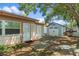 Backyard with patio, shed, and mature trees at 7208 Clouchester Ct, Hudson, FL 34667