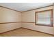 Simple bedroom with light walls and wood flooring at 7208 Clouchester Ct, Hudson, FL 34667