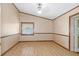 Bedroom with laminate flooring and wood trim at 7208 Clouchester Ct, Hudson, FL 34667
