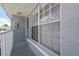 Enclosed patio with door and large window at 7712 Hillside Ct # 202, Hudson, FL 34667