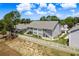 Condo building featuring well-kept landscaping, a staircase to upper units and inviting curb appeal at 7712 Hillside Ct # 202, Hudson, FL 34667