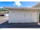 Exterior storage units in the parking lot offer convenient space for residents at 7712 Hillside Ct # 202, Hudson, FL 34667