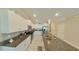 Modern kitchen with granite countertops and stainless steel appliances at 31941 Blue Passing Loop, Wesley Chapel, FL 33545