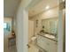 Clean bathroom with granite vanity and shower/tub combo at 31941 Blue Passing Loop, Wesley Chapel, FL 33545