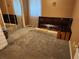 Spacious bedroom with mirrored closet doors and carpeting at 11033 Baywind Ct, Weeki Wachee, FL 34613