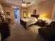 Bright and airy bedroom with ensuite bathroom access at 11033 Baywind Ct, Weeki Wachee, FL 34613