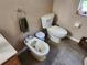 Bathroom featuring a toilet and bidet at 11033 Baywind Ct, Weeki Wachee, FL 34613