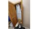 Built-in ironing board in laundry room cabinet at 11033 Baywind Ct, Weeki Wachee, FL 34613