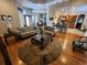 Spacious living room with hardwood floors and ample natural light at 11033 Baywind Ct, Weeki Wachee, FL 34613