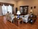 Living room with hardwood floors and elegant furniture at 11033 Baywind Ct, Weeki Wachee, FL 34613