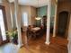 Bright dining room with hardwood floors and a large table, perfect for Gathering gatherings at 11033 Baywind Ct, Weeki Wachee, FL 34613