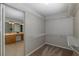 Large walk-in closet with wire shelving and adjacent bathroom at 1633 Arbor Knoll Loop, Trinity, FL 34655