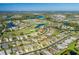 Property view showcasing home's location in a community at 1633 Arbor Knoll Loop, Trinity, FL 34655