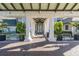 Elegant clubhouse entry with columns and seating at 1633 Arbor Knoll Loop, Trinity, FL 34655
