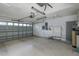 Attached garage with automatic door opener and ample storage space at 1633 Arbor Knoll Loop, Trinity, FL 34655