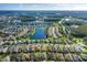 Property view showcasing home's location in a community at 1633 Arbor Knoll Loop, Trinity, FL 34655