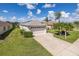 Single-Gathering home with a garage and nicely landscaped yard at 1633 Arbor Knoll Loop, Trinity, FL 34655