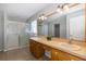Bathroom boasts double sinks, tiled floors and a shower at 1633 Arbor Knoll Loop, Trinity, FL 34655