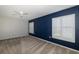 Bright bedroom featuring neutral walls, carpeting and window shutters at 1633 Arbor Knoll Loop, Trinity, FL 34655