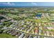Property view showcasing home's location in a community at 1633 Arbor Knoll Loop, Trinity, FL 34655