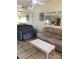 Inviting living room with tile floors and comfortable sofas at 20861 Haulover Cv # C4, Lutz, FL 33558
