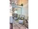 Spacious living room mirroring into a comfortable seating area at 20861 Haulover Cv # C4, Lutz, FL 33558