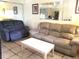 Comfortable living room featuring plush seating and neutral decor at 20861 Haulover Cv # C4, Lutz, FL 33558