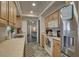 Efficient kitchen layout, wood cabinetry and modern appliances at 3960 Lema Dr, Spring Hill, FL 34609