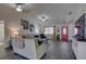 Spacious living room with modern furnishings, neutral decor, and an inviting atmosphere at 3960 Lema Dr, Spring Hill, FL 34609