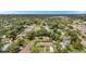 Aerial view of a residential neighborhood showcasing mature trees, well-maintained lawns, and tree lined streets at 800 61St N St, St Petersburg, FL 33710