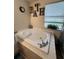 Bathroom with a large soaking tub featuring tile surround and a garden window at 800 61St N St, St Petersburg, FL 33710