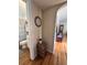 Cozy bathroom featuring decorative shower curtain, classic vanity, and wooden floors at 800 61St N St, St Petersburg, FL 33710