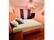 Comfortable bedroom featuring a bed, ceiling fan, and ample natural light at 800 61St N St, St Petersburg, FL 33710