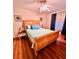 Relaxing bedroom featuring a comfortable bed and a ceiling fan at 800 61St N St, St Petersburg, FL 33710