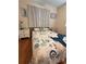 This bright bedroom features hardwood floors and decorative, coastal-themed decor at 800 61St N St, St Petersburg, FL 33710