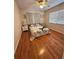 Charming bedroom with hardwood floors and coastal-themed bedding and decor at 800 61St N St, St Petersburg, FL 33710