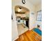 Bright kitchen with white cabinets, granite counters, and stainless-steel appliances at 800 61St N St, St Petersburg, FL 33710