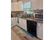 Kitchen features a modern sink, stainless appliances, and granite countertops at 800 61St N St, St Petersburg, FL 33710
