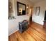 Living room with built-in decor, hardwood floors and wall mirror at 800 61St N St, St Petersburg, FL 33710