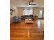 Open living room with hardwood flooring, bright windows and comfortable seating at 800 61St N St, St Petersburg, FL 33710