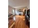 Open-concept living room featuring hardwood floors and natural light at 800 61St N St, St Petersburg, FL 33710