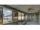 Sunroom with tiled floor and pool view at 3960 Lema Dr, Spring Hill, FL 34609