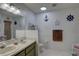 Clean bathroom with a double vanity and a walk-in shower at 3960 Lema Dr, Spring Hill, FL 34609