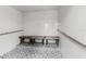 Clean shower room with tiled walls and benches at 7050 Sunset S Dr # 1504, South Pasadena, FL 33707