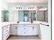 Double vanity bathroom with large shower at 19492 Fort King Run, Brooksville, FL 34601